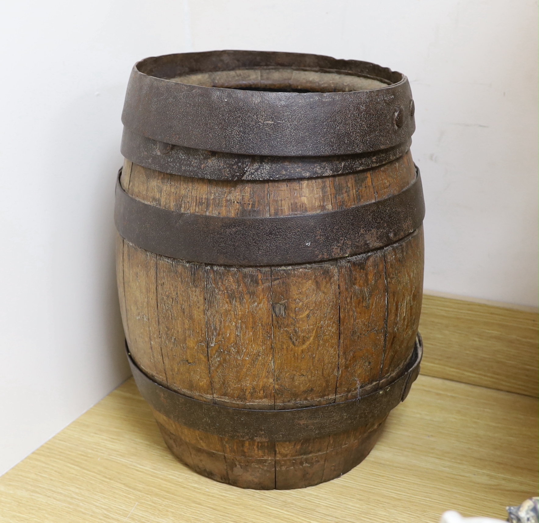 A wrought iron bound coopered oak barrel, 44cm